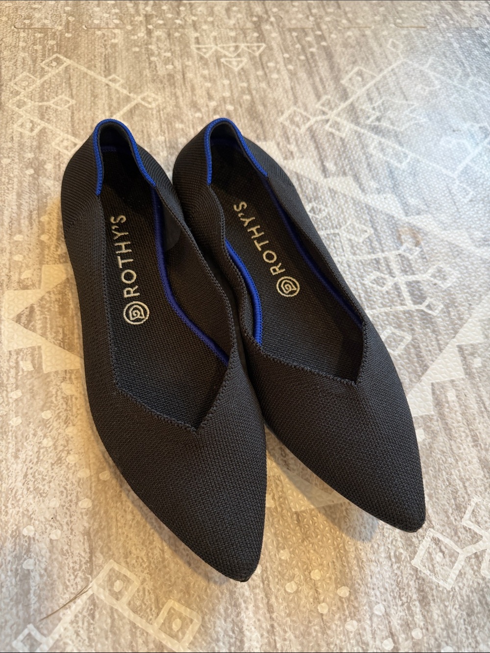 Rothy's Black Pointed Knit Flats with Royal Blue Trim